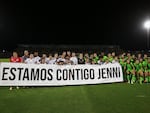 Players with Hermoso's club team, Pachuca, hold a banner reading in Spanish "we are with you Jenni", ahead of a match in Ciudad Juarez, Mexico on Aug. 25. The kiss by Luis Rubiales has unleashed a storm of fury over gender equality, and now looks set to go down as a milestone in both Spanish soccer history but also in women's rights.