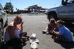 Tara Major waits for Red Cross assistance in Redmond after fleeing the McKenzie fire, Sept. 8, 2020.