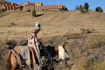 It was a somber goodbye to Kah-Nee-Ta for many. A young woman in traditional regalia marched on horseback to the final Saturday salmon bake with traditional dancing. 