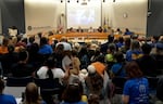 Attendees filled the room for the meeting. 