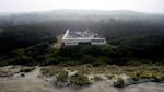 An aerial image taken in the summer of 2021 shows part of the PacWave wave energy test facility on the Oregon Coast. The facility will provide wave energy developers a place to test their devices in the open ocean and transport the energy they produce back to the grid. Construction crews installed conduit and high-capacity power cable under the beach at Driftwood State Park and out into the ocean to the test site 7 miles offshore.