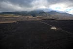 August 10: A burned hillside above Lahaina shows the aftermath of wildfires in western Maui in Lahaina, Hawaii.