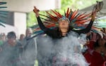 Aztec dancer Maira Barrera Mazatl of Sublimity dances during opening prayers at “Tending Our Roots,” an event aimed at bringing awareness to missing and murdered Indigenous people, held at South Hawthorne Waterfront Park in Portland, May 5, 2022.