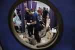 Palestinians who were injured during a food distribution at a center run by the Gaza Humanitarian Foundation, a U.S.-backed organization approved by Israel, receive treatment on the floor of Nasser Hospital in Khan Younis, southern Gaza Strip, Saturday, July 19, 2025.