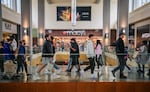 People shop at a mall in Houston, Texas.