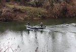 A motorized drift boat on the upper Siletz River near the Ojalla Bridge on Feb. 15, 2026. The Oregon State Marine Board is expected to issue a temporary ruling whether to ban motorized boats on the river. 