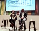 Portland City commissioners Carmen Rubio, left, and Mingus Mapps speak to a crowd at Revolution Hall about the state of Portland's music industry, Nov. 1, 2021.