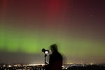 The northern lights, produced by a solar geomagnetic storm, are seen from Shenandoah National Park in Rileyville, Virginia, on Oct. 10. 