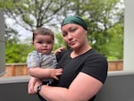 Ada McGraw poses with her 10-month-old Legend for a photo at OPB, May 5, 2026. McGraw worked with singer-songwriter Bre Gregg while she was serving time at the Coffee Creek Correctional Facility to write a lullaby for her son. 
