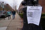A poster seeking information about the campus shooting suspect is seen on the campus of Brown University on Dec. 17, 2025, in Providence, R.I.