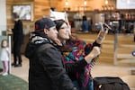 Ignacio Garcia-Pablo, 21, takes a selfie with Marta Guembes, Honorary Consul of the Guatemalan Consulate of Oregon.