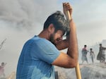 Zomir Hussain, a Rohingya refugee and father of 6, weeps after a devastating fire in March 2023 destroyed thousands of homes in the camp. Hussain says he he lost all of his family's possessions. "Now I have nothing to eat and wear. I need everything new to rebuild my life."