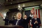 President Bill Clinton accepts the applause of members of Congress at his 1999 State of the Union address.