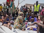 South Sudanese who fled from Sudan sit outside a nutrition clinic at a transit center in Renk, South Sudan, May 16, 2023. Fighting in Sudan has displaced 10 million people, according to U.N. figures.