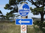 A photo released by NOAA shows a tsunami evacuation route sign near Newport.