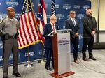 Ohio Gov. Mike DeWine (R) speaks at a press conference at Springfield City Hall alongside Ohio State Highway Patrol Colonel Charles Jones, left, Director of the Department of Public Safety Andy Wilson, second from right, and Springfield City School Superintendent Robert Hill, right, in Springfield, Ohio, Monday, Sept. 16, 2024. (AP Photo/Patrick Aftoora-Orsagos)