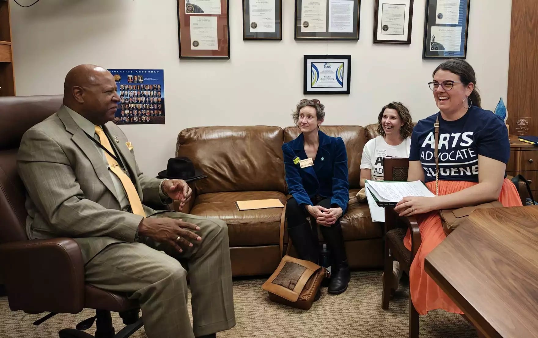 Sen. James Manning, D-Eugene, meets with arts advocates from Eugene in his office at the Oregon Capitol on April 15, 2025.