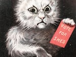 Cats were used as a symbol of anti-suffrage propaganda, but reclaimed by some suffragists. A century later, some voters see Vance's "cat lady" comments as a call to mobilize.
