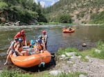 Rafters from Noah’s River Adventures from Ashland, Ore., depart from Spring Island for a float on the Upper Klamath River in June 2023.
