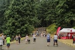 Large pathways were available for pedestrians to use in attempts to keep people a safe distance away from the track.