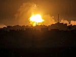 A fireball from an explosion erupts during Israeli bombardment on Khan Younis from Rafah in the southern Gaza Strip early on Wednesday.