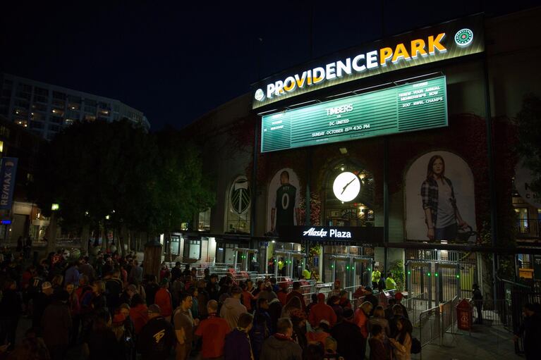 Several hundred of the Portland Thorns' biggest fans eagerly await entrance to Providence Park for the team's championship celebration Sunday, Oct. 15, 2017. 