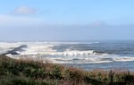 Coos Bay Harbor Entrance Viewpoint, near the Charleston Marina. Proposed turbines would be 18 or more miles offshore from this location. Photographed on Dec. 7, 2023