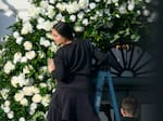 Wedding details were kept under wraps. The day before the ceremony, workers arranged flowers and seating at the South Portico of the White House.