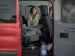 Anna Kobernyk waits in van at the Poland-Ukraine border.