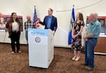 U.S. Senator Ron Wyden at a press conference in Grants Pass on July 18, 2024. From left to right, Grants Pass Housing and Neighborhood Specialist Amber Neeck; Doug Walker, residential developer and chair of the city's Housing Advisory Committee; City Councilor Vanessa Ogier; and Jed Keller, a community volunteer.