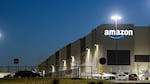 The Amazon.com, Inc. BHM1 fulfillment center is seen before sunrise on March 29, 2021 in Bessemer, Alabama. Amazon announced it is ending its charity donation program, AmazonSmile.