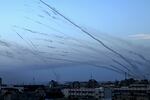 Rockets are fired from Gaza City toward Israel on Oct. 7, 2023.