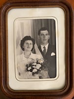 A picture of a family photograph of Catherine Tournellec and Jean Salaün on their wedding day in June 1950. Salaün died in 1971.