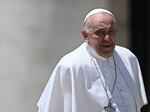 Pope Francis leaves a mass on World Children's Day at St Peter's Basilica in the Vatican on May 26.