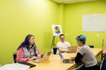 Hailey Ockinga (from left), Biff Chaplow and Havana Moon of Beyond These Walls on Sept. 30 at Q Center, an LGBTQ community center in Portland, Ore.