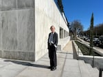 OPB politics reporter Lauren Dake stands on the steps of the Capitol building in Salem on Feb. 25, 2026.