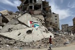 A mural of Lamine Yamal amongst destruciton in Gaza on June 15, 2026.