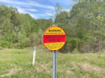 A sign for a carbon dioxide pipeline in Satartia, Miss. There are now about 5,300 miles of CO2 pipelines in the U.S., but in the next few decades, that number could grow to more than 65,000 miles.