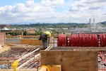 The roof of the new Knight Cancer Institute will have a little pub where researchers can collaborate and enjoy the million dollar views of Mount Hood and the Willamette.