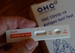 A positive COVID home test is shown in this image. Public health experts say we’re now in the midst of a growing summer surge of COVID in the U.S.