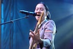 Japanese Breakfast’s Michelle Zauner plays the guitar during a sold-out show on Aug. 19, 2023, at Portland’s Pioneer Courthouse Square.