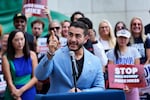 Democratic nominee for U.S. Senate Abdul El-Sayed speaks at a news conference at the base of the Spirit of Detroit monument in Detroit, Wednesday, Aug. 19, 2026. (AP Photo/Paul Sancya)
