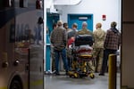 Emergency crews and military personnel are seen at the Wainwright Health Centre as injured military members are treated after a fire at Canadian Forces Base Wainwright, outside of Wainwright, Alberta Saturday, Oct. 17, 2026.
