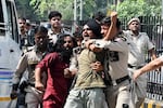 Policemen detain protesters during a youth demonstration demanding the resignation of the country's election chief Gyanesh Kumar, in New Delhi, India, Saturday, Oct. 10, 2026.