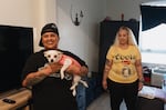 Dulce Volantin (left), Valaria Zayas and their dog, Zoey in their apartment. Their building has building with on-site case management.