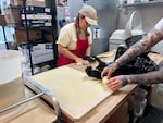 Pipsqueak Bagels owner Madilyn Gibbons hand-rolls bagels at her shop in Portland, Ore on May 13, 2026.