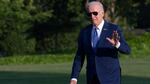 President Joe Biden waves from the South Lawn of the White House on Thursday.