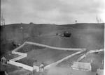 Some of Multnomah County's Poor Farm's agricultural areas were located on cleared forestland, circa 1898.