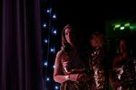 After rushing to get out of her quinceañera gown and into a mandatory golden dress for the opening of the public evening of Miss Trans Global, a nervous Miss South Africa, Chedino Rodriquez Martin, waits to go on stage.