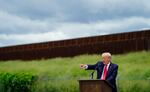 Former President Donald Trump speaks during a visit to an unfinished section of border wall with Texas Gov. Greg Abbott, in Pharr, Texas, Wednesday, June 30, 2021.